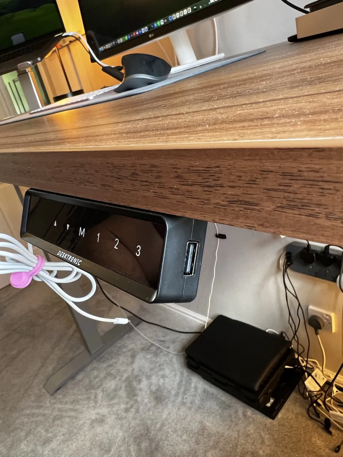 Built-in USB-A charging port on the underside of the Desktronic HomePro controller